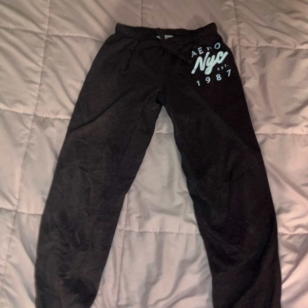 Black Sweatpants with Tapered Legs and Elastic Cuffs